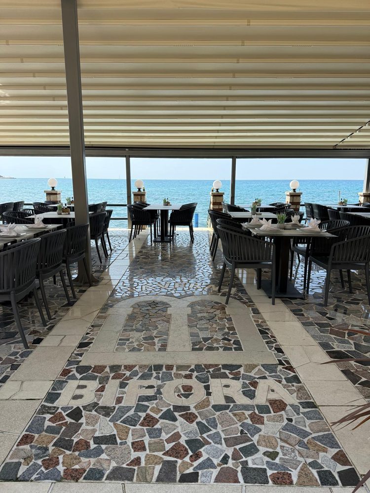 Bifora stone mosaic floor